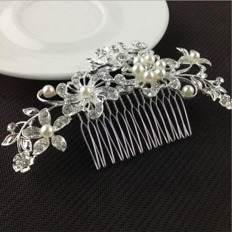 Silver ornamented hair comb